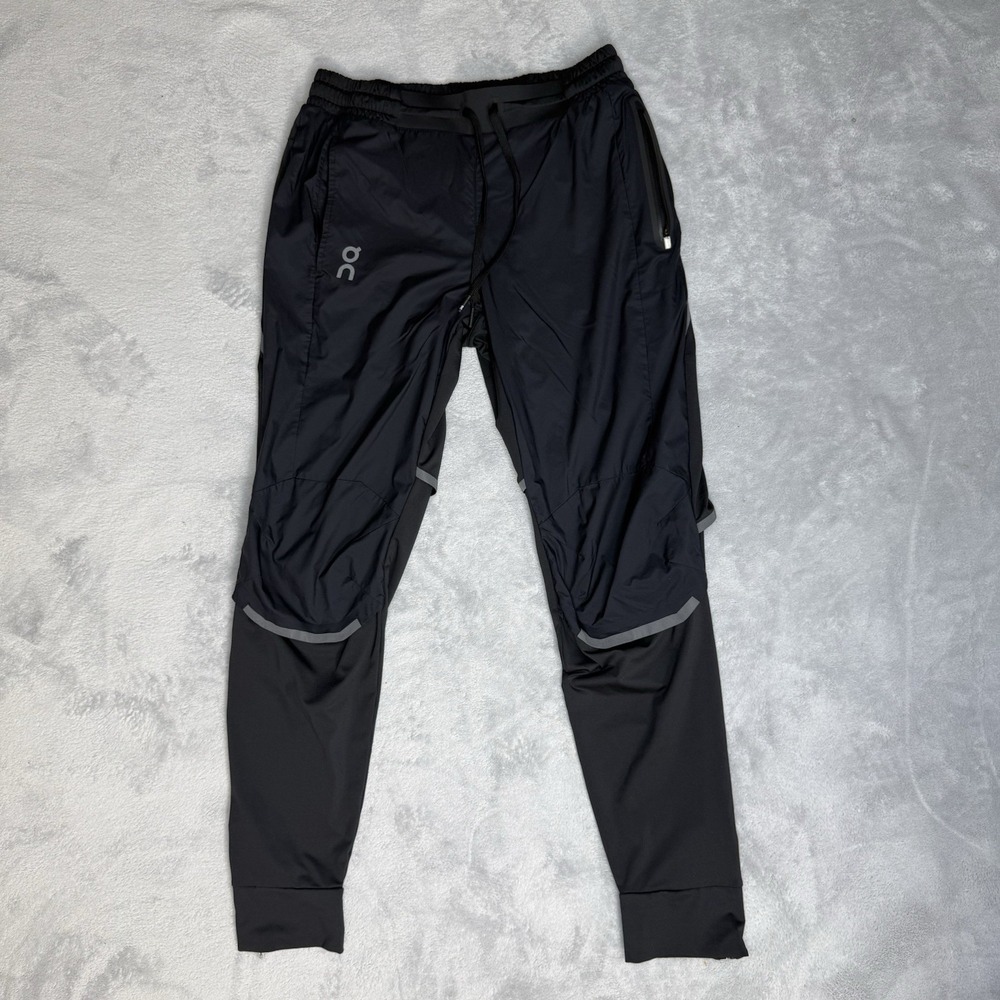 On Running Pants Men S Black Run On Clouds Reflective Zip Pocket Ankle Jogger